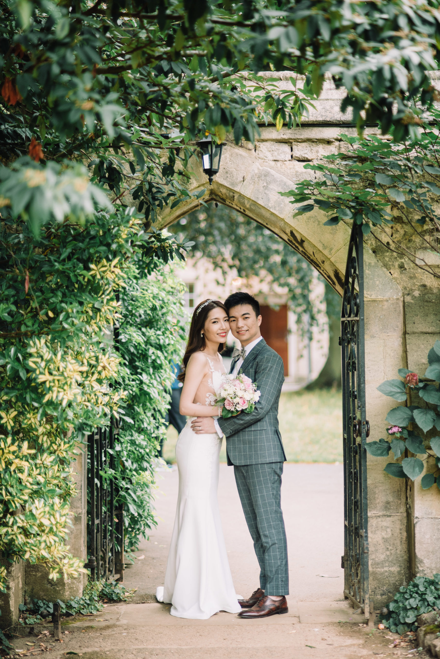 Bride and groom on their wedding day in Oxford with wedding photographer