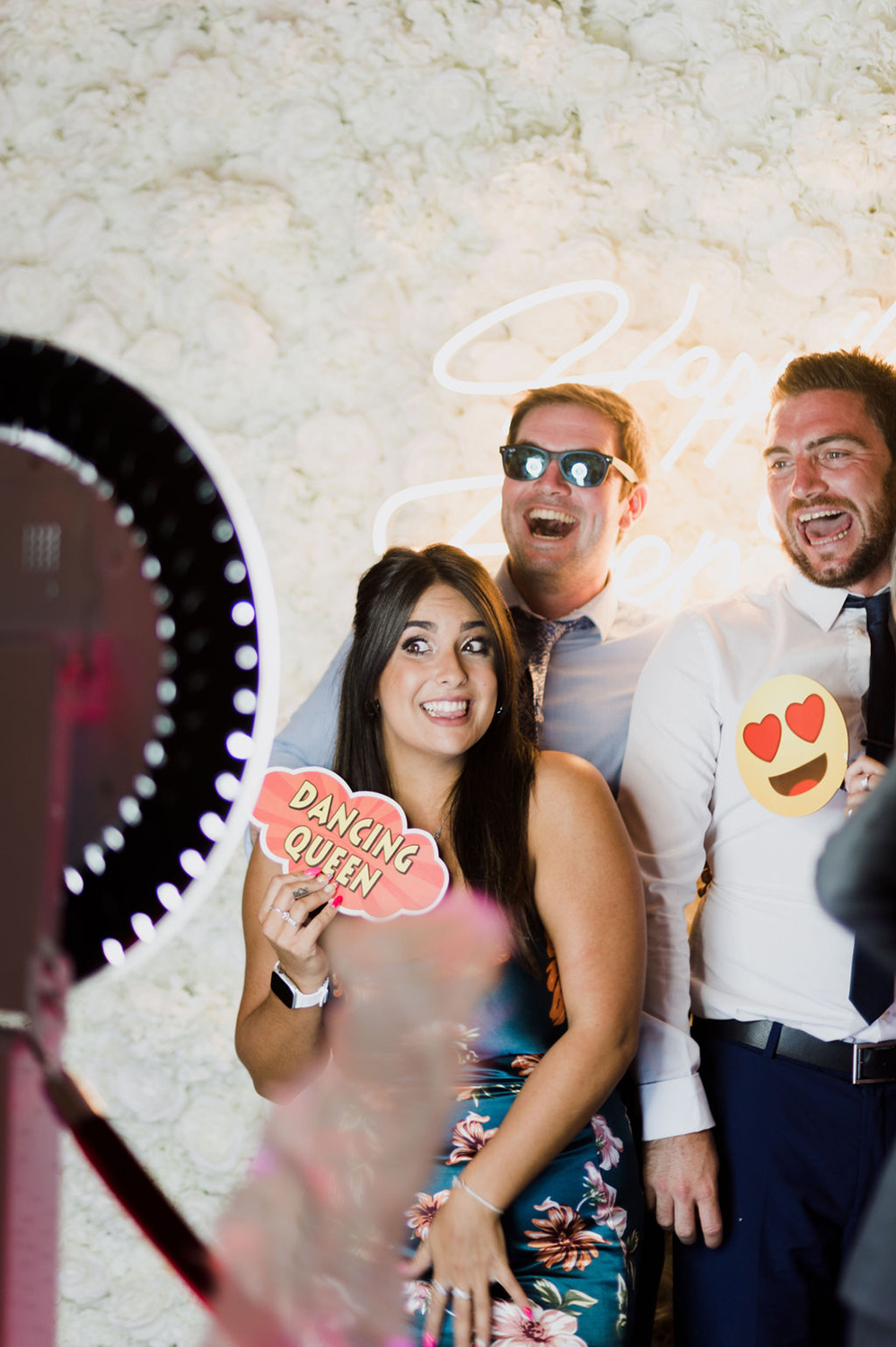 Liberty Pearl Photo & Film Collective Devon Wedding Photography at Deer Park Country House. Guests pose in photo booth.