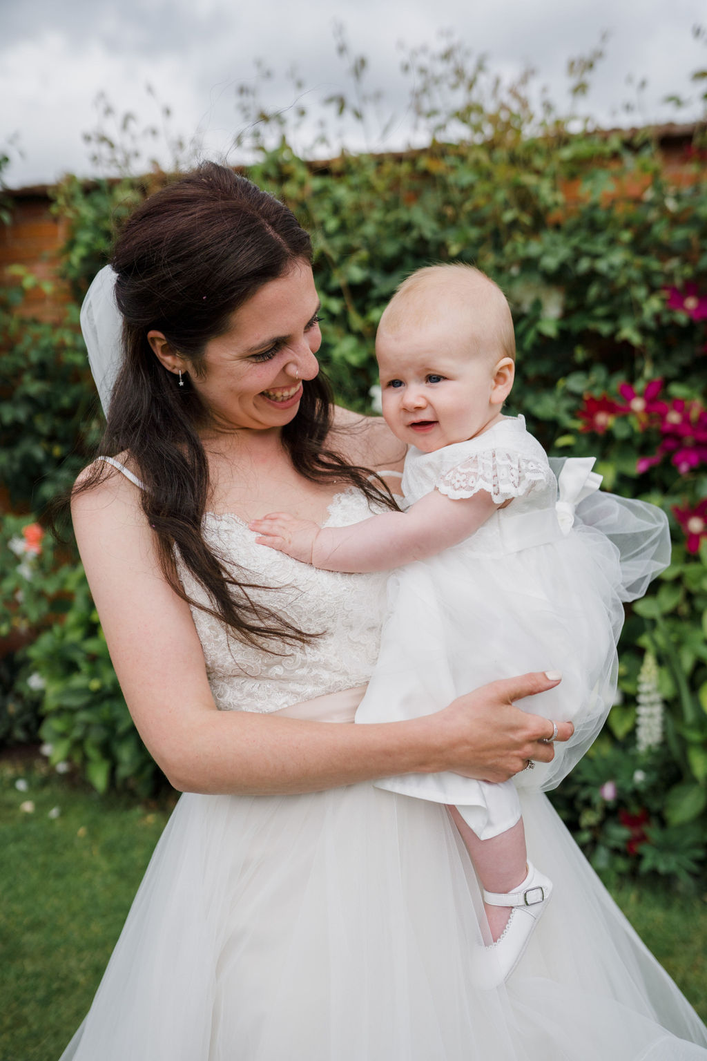 Upton Barn and Walled Gardens wedding, the bride Lauren with her daughter.